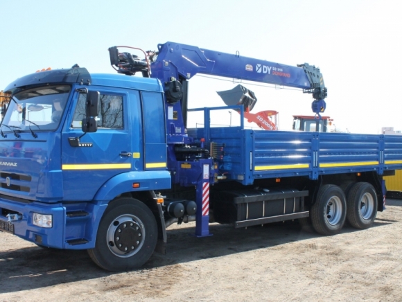 Бортовой КамАЗ 65117 с КМУ DongYang 1926