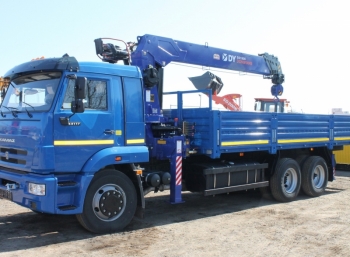 Бортовой КамАЗ 65117 с КМУ DongYang 1926